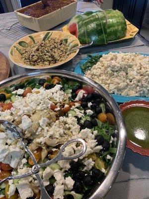 Greek salad, Hawaiian potato salad and watermelon