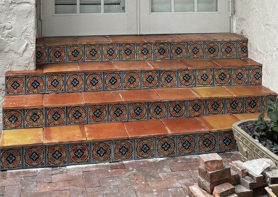 My beautiful new steps with sealed Saltillo and decorative Talavera tiles from Sunshine Tiles and Marble.