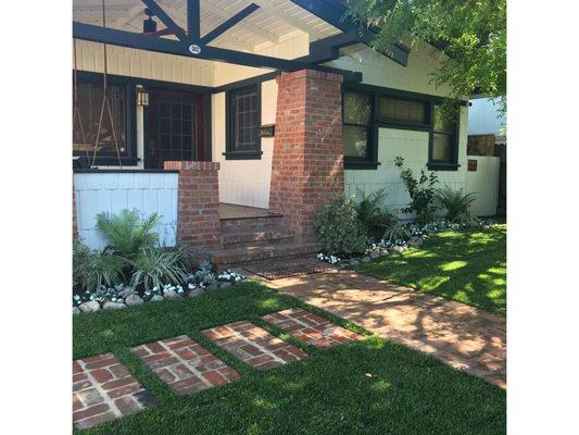 Classic Santa Monica bungalow shaded entry garden and brick stepstones