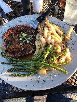 Teriyaki pork ribeye, garlic Parmesan fries and roasted asparagus (special for the evening)