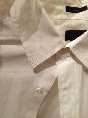 All the colors in the shirts are gone except this little area at the end of the collar.