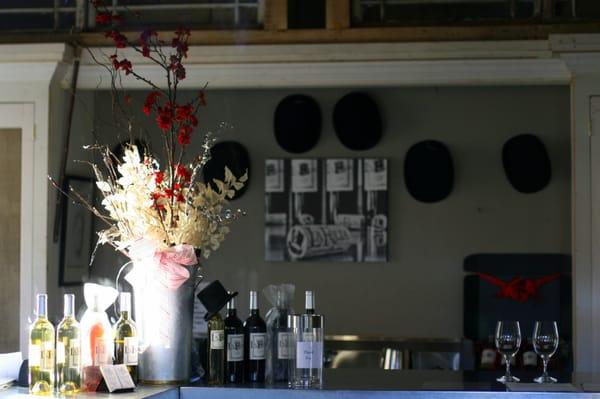 Wine room interior shot. Note the hats!