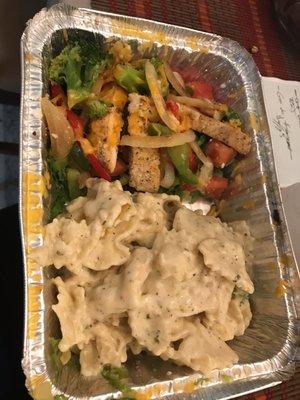 Fully loaded salad and Alfredo pasta. Chicken and shrimp for both. Two of my favorite dishes