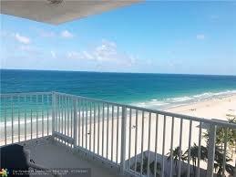 condo private balcony view of beach.