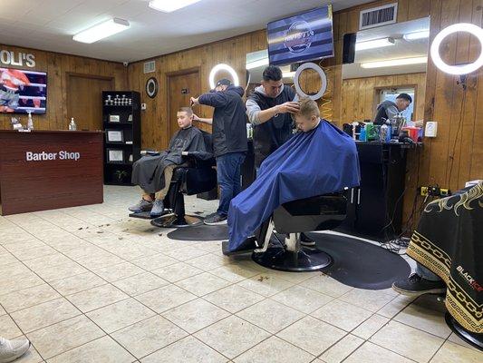 The boys getting their haircut