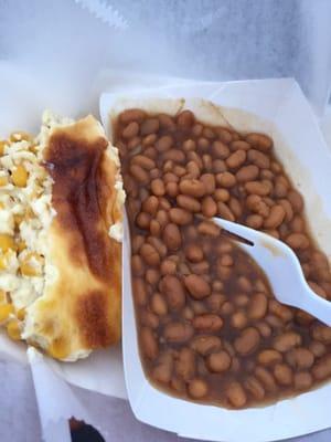 Baked beans, which had sriracha sauce cooked in, and a corn soufflé dish. Great helpings for the price!