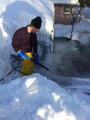 Ice dam removal on a roof