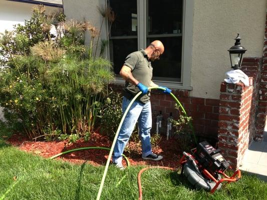 Hydro jetting the main sewer line