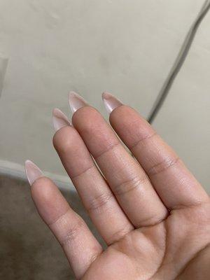 Mess on the back of the nails.