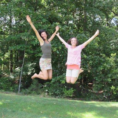 Lucy & Kristen jump for joy in nature!