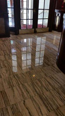 After picture of a highly trafficked 90 year old marble floor restoration in a condominium building Center City Philadelphia 19107