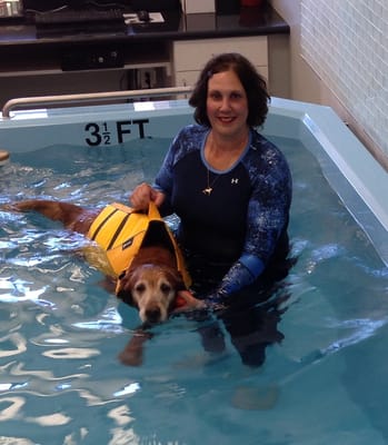 Dr. Caruso swimming in the pool.