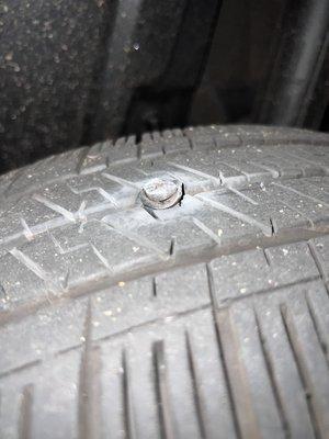 Tire with screw