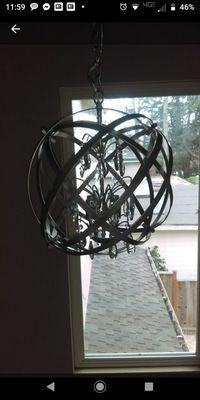 Installed and wired in new chandalier sphere hanging light fixture.