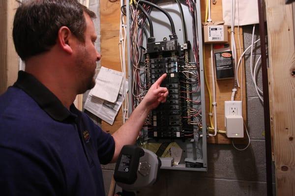 Rick inspecting the electric panel