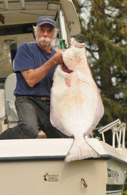 Captain Dennis gets his 50 pound Halibut..9.16.17