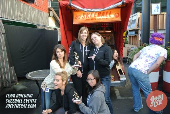 Office Skeeball champions from their team building tournament.