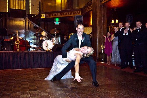 A beautifully executed over the hip drop by Jon and Carla at their wedding.