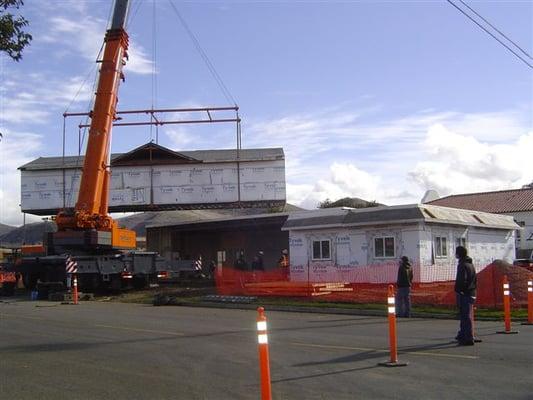 7 pc. custom modular building, being craned in.