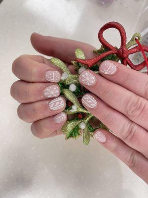 Dip manicure with snowflakes