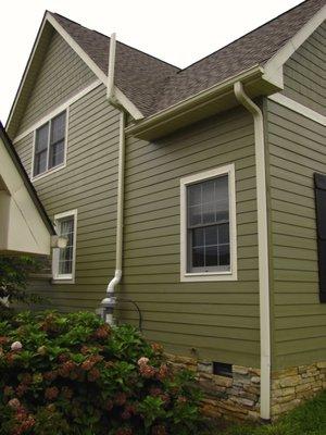 Color-matched downspout.