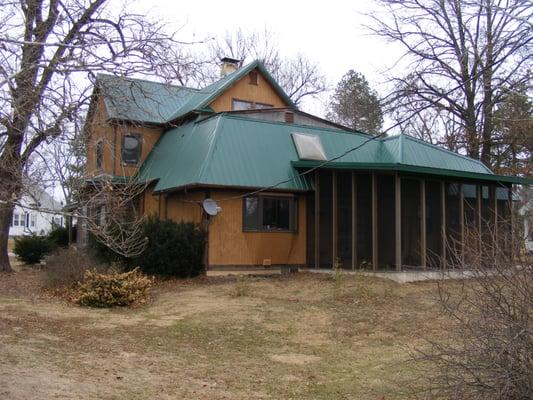 Exposed fastener metal roof