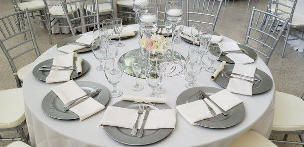 tables settings, china ware, wine glasses rental, servers and bartender service, center table decorations