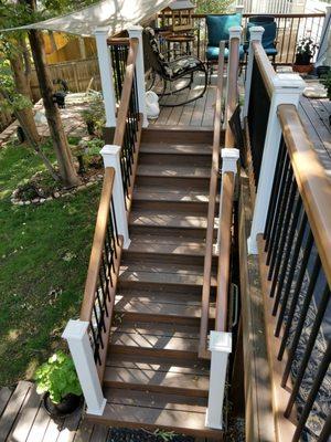 This is a set of stairs for a Trex deck with a continuous handrail