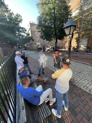 Jay gives the boys from Texas a history lesson in front of Christ Church