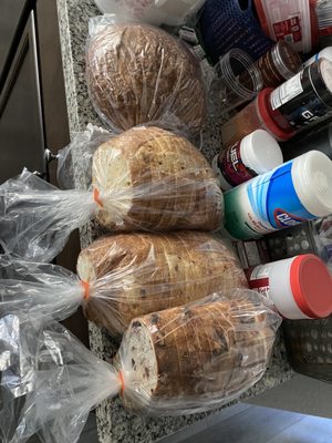 Sour dough loaf, jalapeño and cheese, garlic, and raisin and walnut loaf. All so good and fresh!