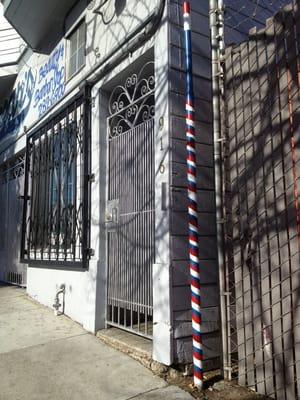 Painted barber pole outside Shear's, 3/9/13