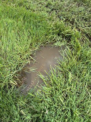 Flooded grave after trying to remove water for several minutes