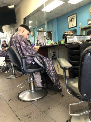 My homie getting a bowl cut