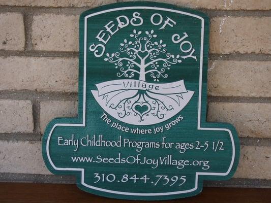 Seeds of Joy Village sign.