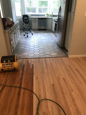 Installed new 5/16" red oak flooring. Before the sanding process