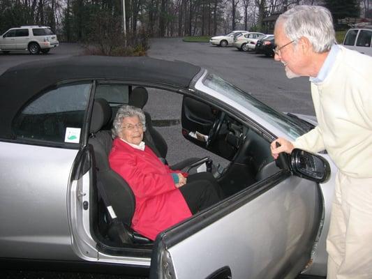 A volunteer taking  one of our members to an appointment.