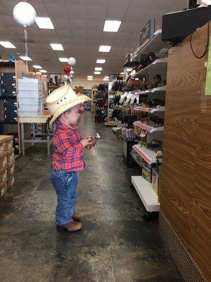 My grandson with his boots, hat and horse from Lebo's