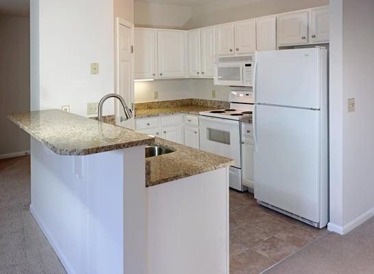 Kitchen with bartop counter