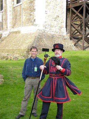 The Raven Master holding a staff that I made for him