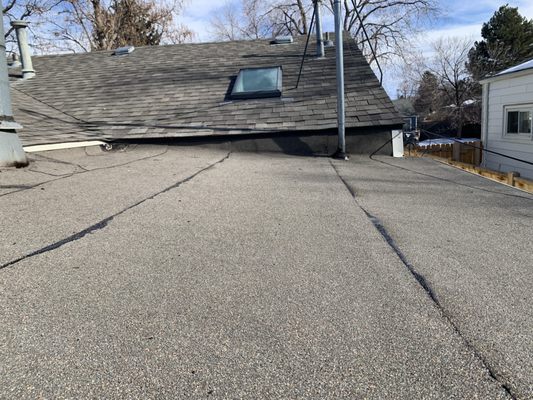 New porch roof (shingles on house were existing)