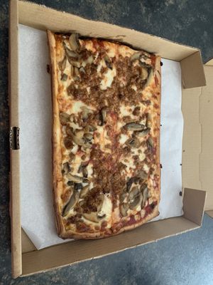 6-cut sausage and mushroom pizza