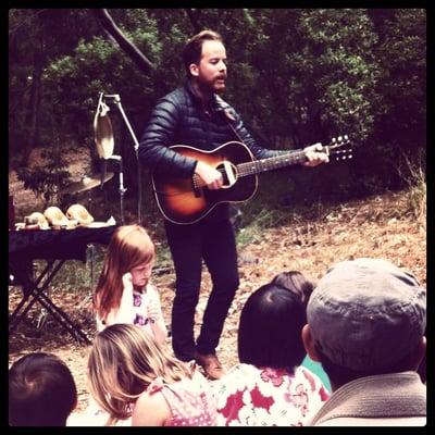 Singing some Leonard Cohen at a wedding.