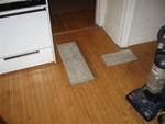 Kitchen floor repaired with concrete after pipes burst.