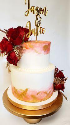 Blush watercolor with gold accents, gold ferns and red roses.  This was a delight!