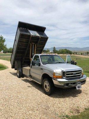 We have a five and a half ton load capacity and a 12 cubic yard surface area to accommodate all your hauling needs.