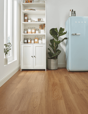 Don't be fooled. This  floor looks like hardwood, but is waterproof & lifeproof, it's LVP! Stop in at Hometown Flooring & Design Center.