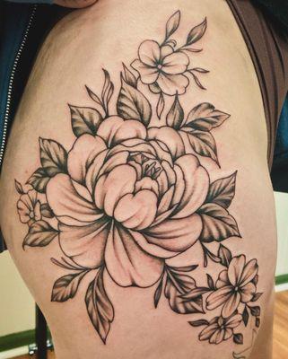 black and gray flowers on hip