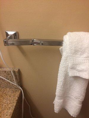 Huge dent in the towel bar. Maybe they thought no one would notice?