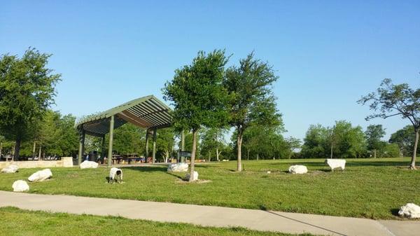 Park with benches and small grills along the trail