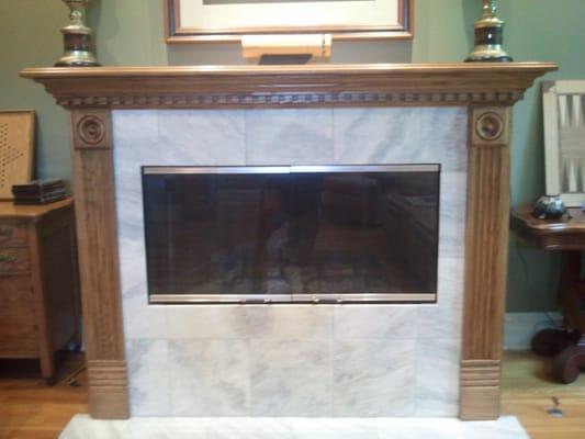 The fireplace surround (The poor detail reflects the photographer & not the cabinetmaker's quality)